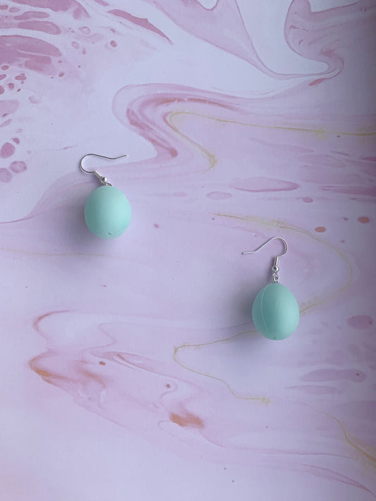 Easter Earrings. Pastel blue easter egg earrings on silver plated hooks. Plastic egg novelty easter earrings in pastel or speckled colours. Hoop earrings. Novelty earrings. pastel earrings.
