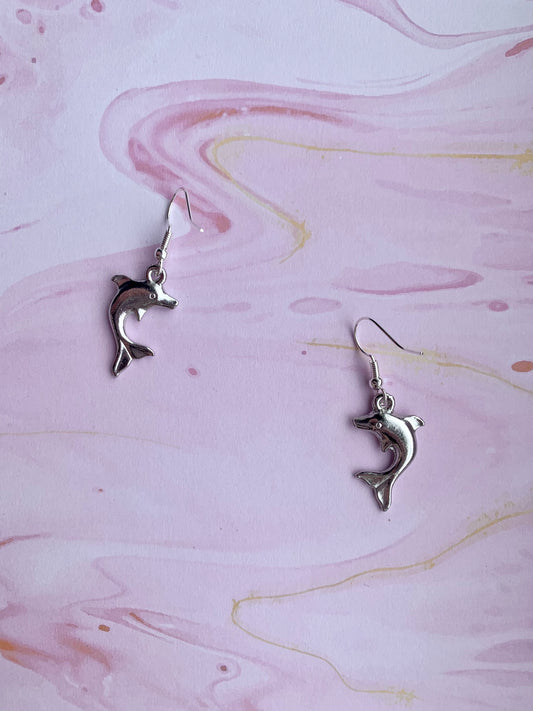 Silver plated dolphin charms on silver plated hooks. Animal earrings. Nature earrings.