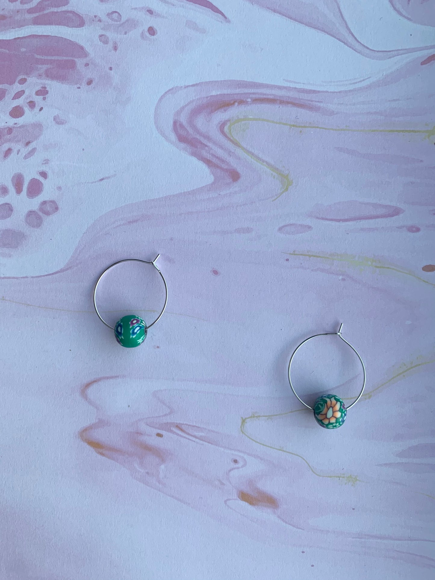 Green Earrings. Polymer clay earrings. flower earrings. Polymer clay flower beads in a variety of colours on silver plated hoops. hoop earrings.
