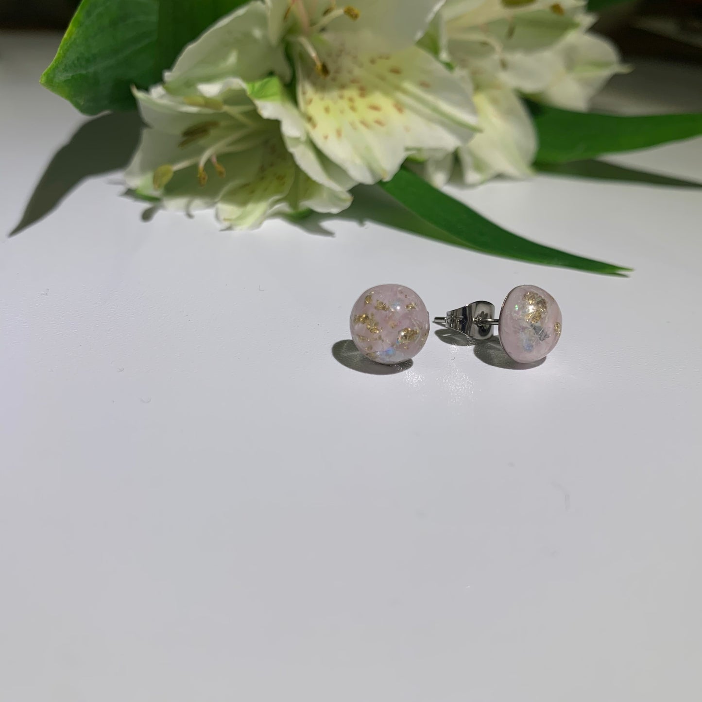 Pale Pink 8mm Resin Cabachon with Gold Lead Speckled throughout on stainless steel studs. Stud Earrings. Pretty Earrings.