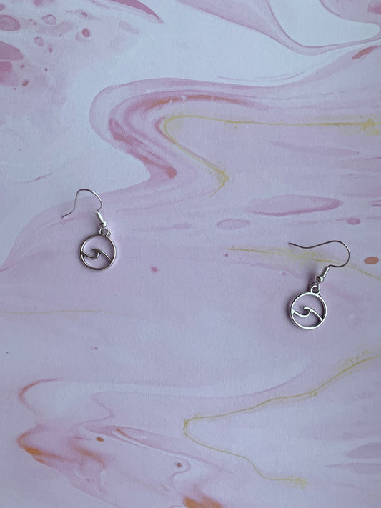 Wave earrings. alloy silver wave outline in a circle charms on silver plated hooks. dangle earrings. ocean earrings. nature earrings. sea earrings