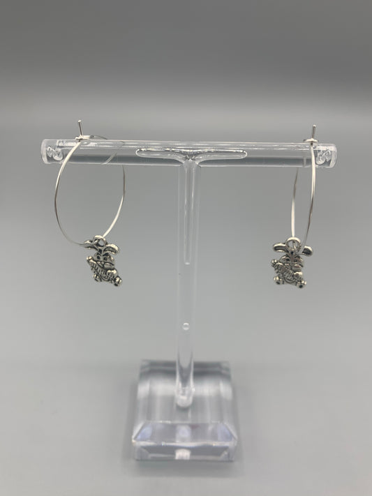 Alloy silver cartoon bunny holding oversized bunny charm on silver plated hoop earrings. easter earrings. Novelty easter earrings. Novelty earrings. Animal earrings. hoop earrings.