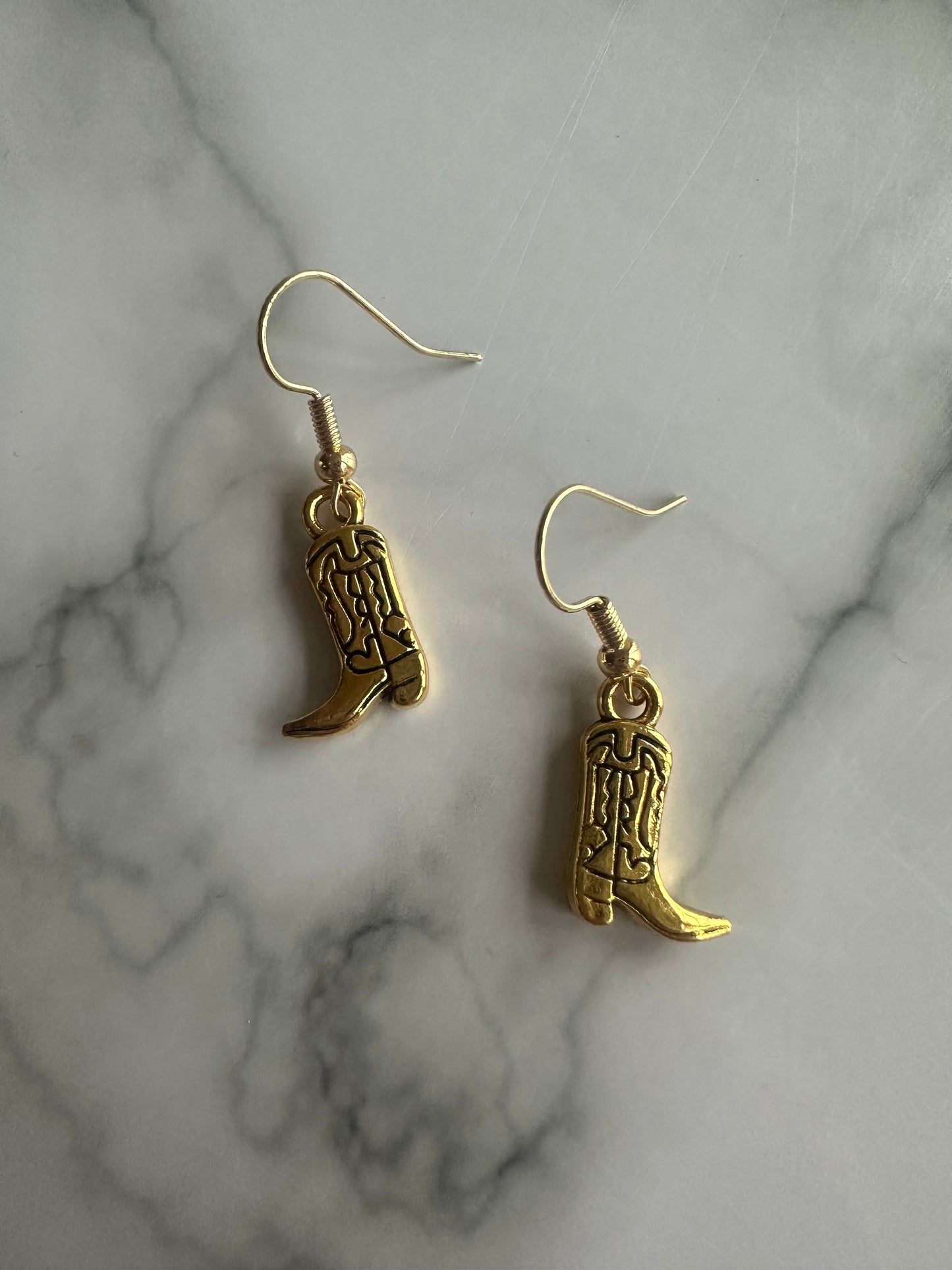 Rustic country western jewellery. Gold coloured hooks with gold cowboy boot design, great for a classic western look.