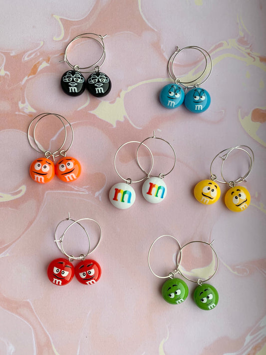 Colourful sugar coated chocolate button candy imitation resin charms on silver plated hoops. hoop earrings. candy earrings. sweet earrings. novelty earrings. colourful earrings. 