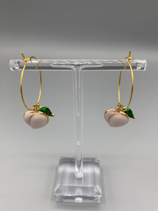 peach earrings. gold earrings. sexy earrings. enamel peach charm on gold plated hoops. hoop earrings. cute earring aesthetic.fun earrings