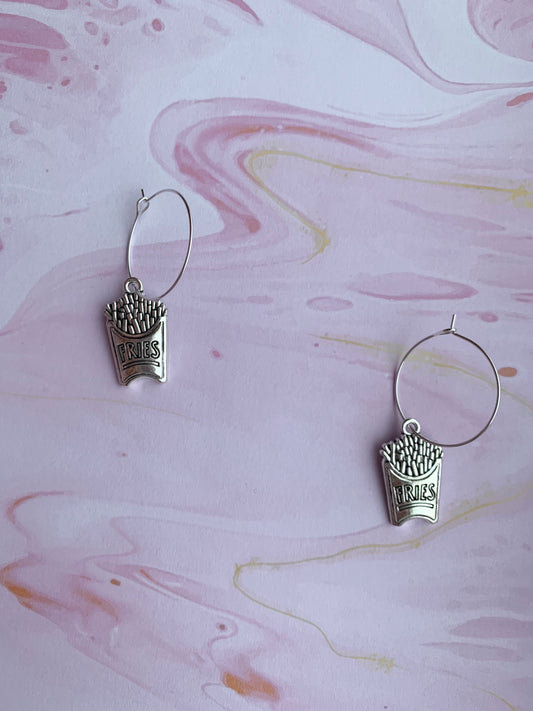 Fries earrings. food earrings. novelty earrings. fun earrings. Silver coloured alloy fries charm on silver plated hoops. hoop earrings. 