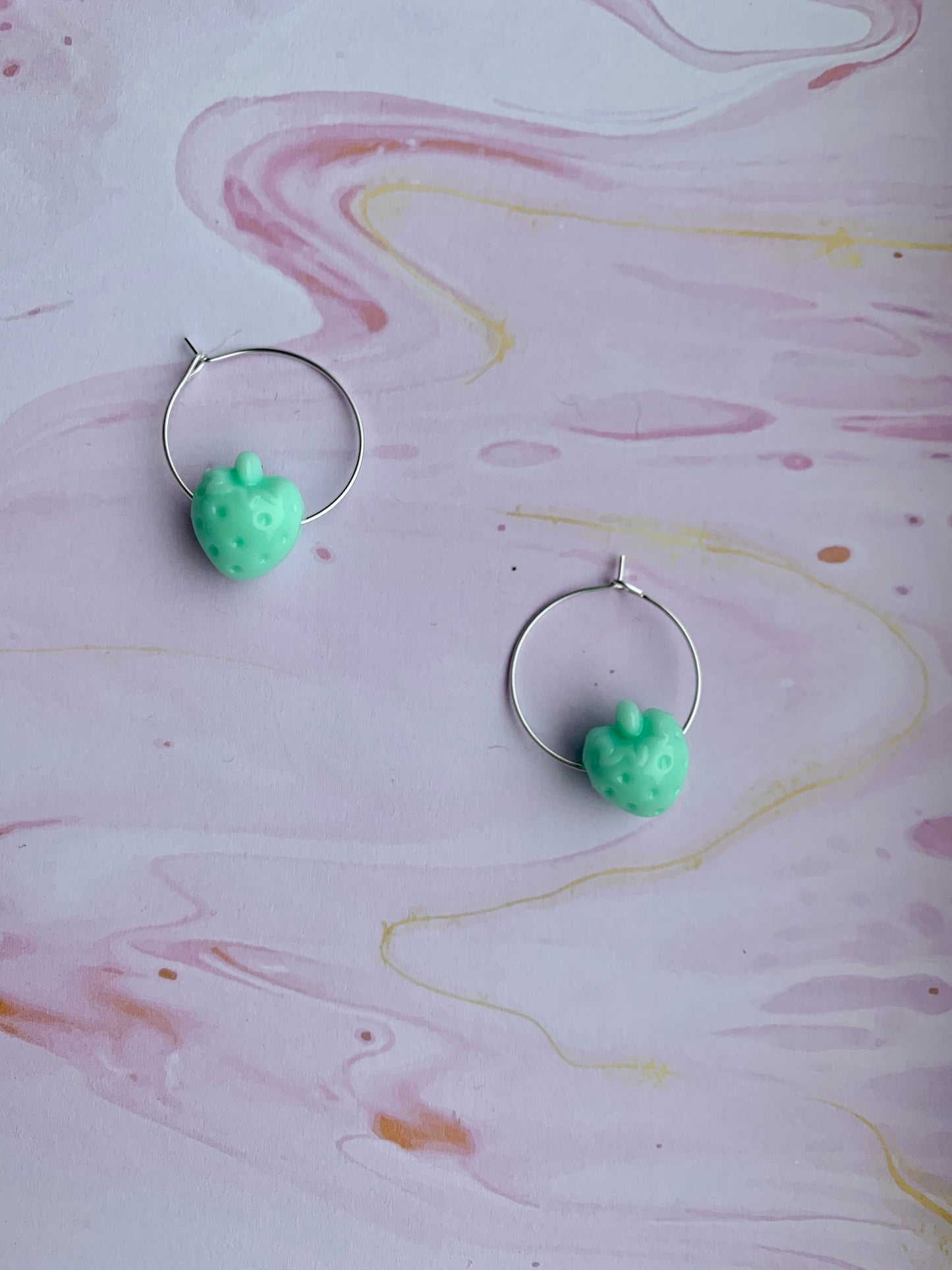 Peppermint green coloured strawberry hoop earrings. cheap earrings
