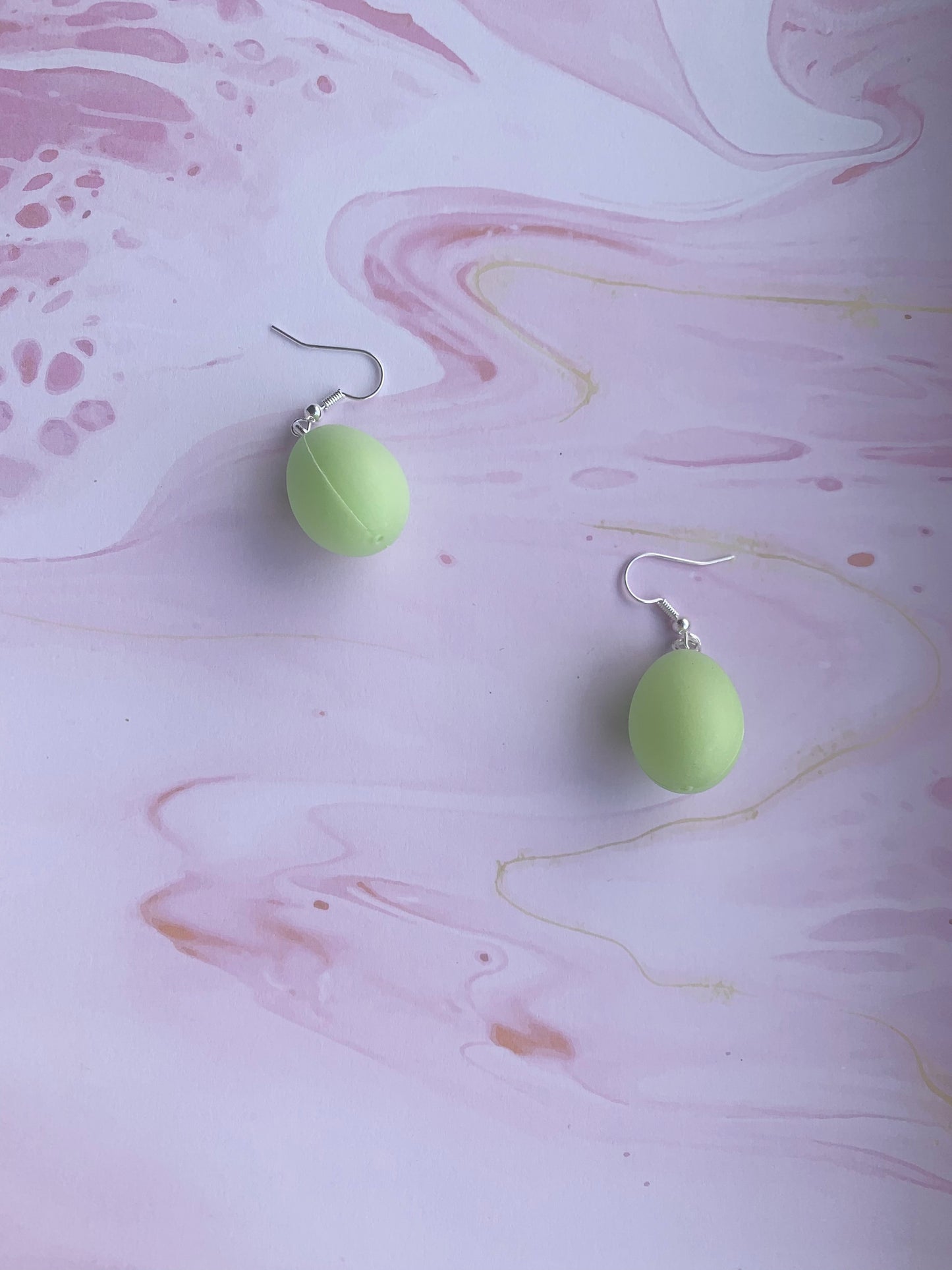 Easter Earrings. Pastel green easter egg earrings on silver plated hooks. Plastic egg novelty easter earrings in pastel or speckled colours. Hoop earrings. Novelty earrings. pastel earrings. 