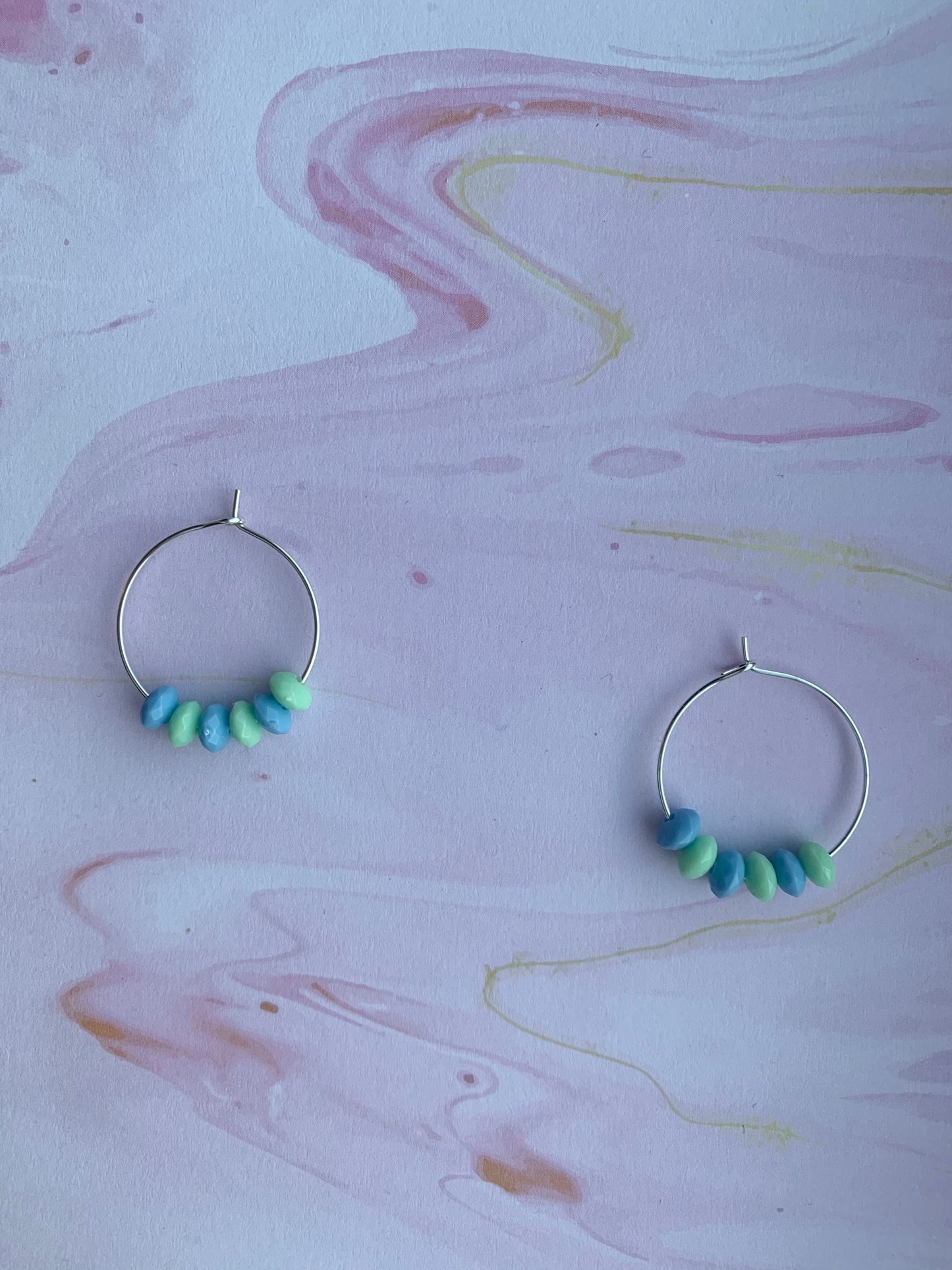 Green and blue pastel bead earrings on silver plated hoops. hoop earrings. handmade earrings.