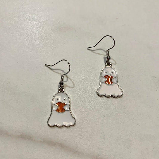 Earrings with  a white ghost holding an orange pumpkin  