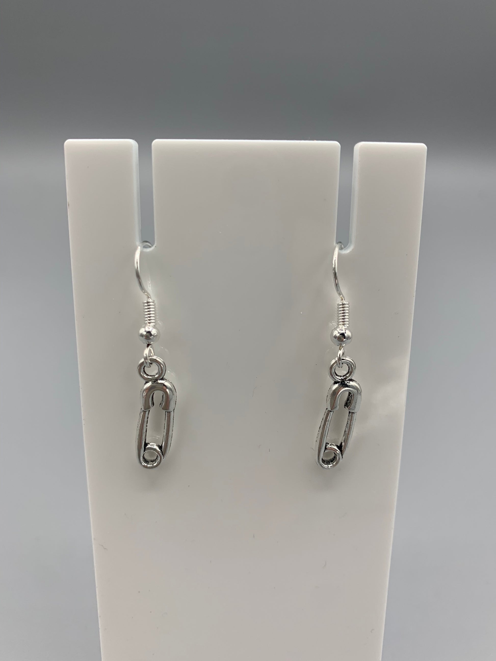 goth earrings. emo earrings. Silver coloured alloy safety pin charm on silver plated hooks.  earrings uk. funky earrings. 