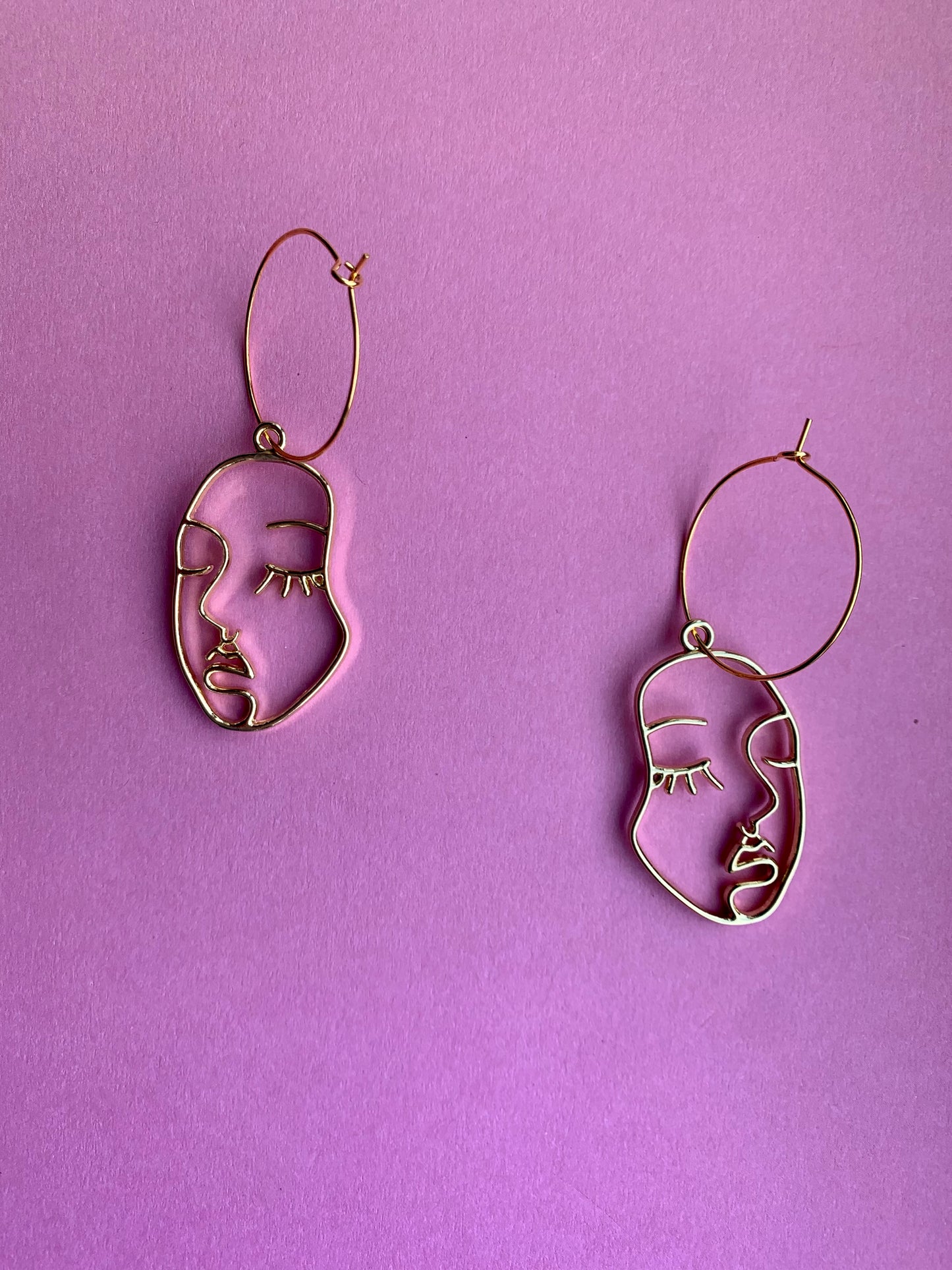 Face Outline Gold Earrings