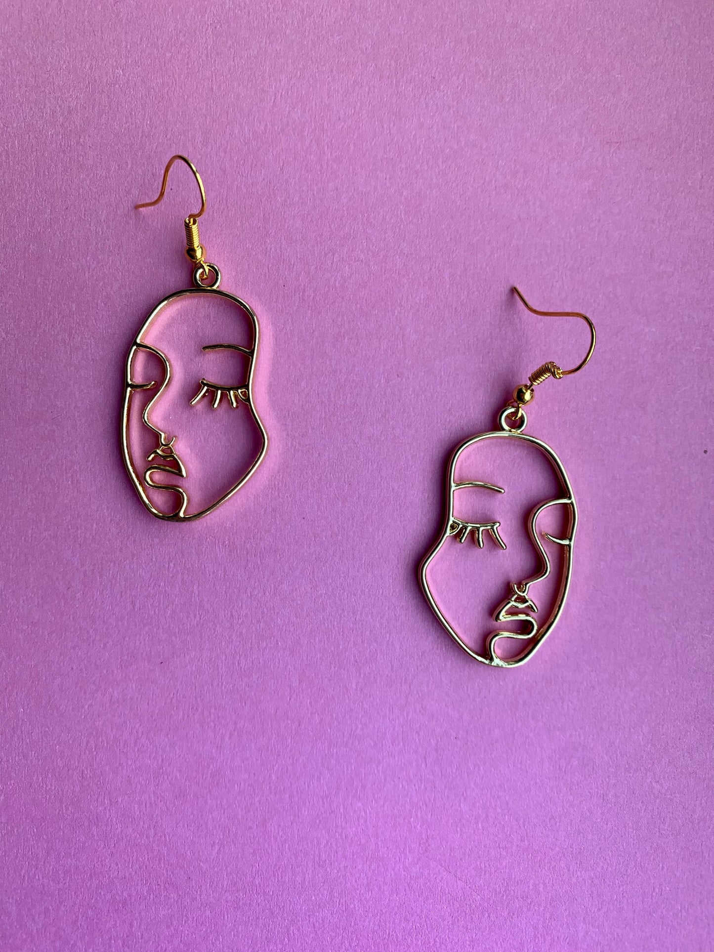 Face Outline Gold Earrings